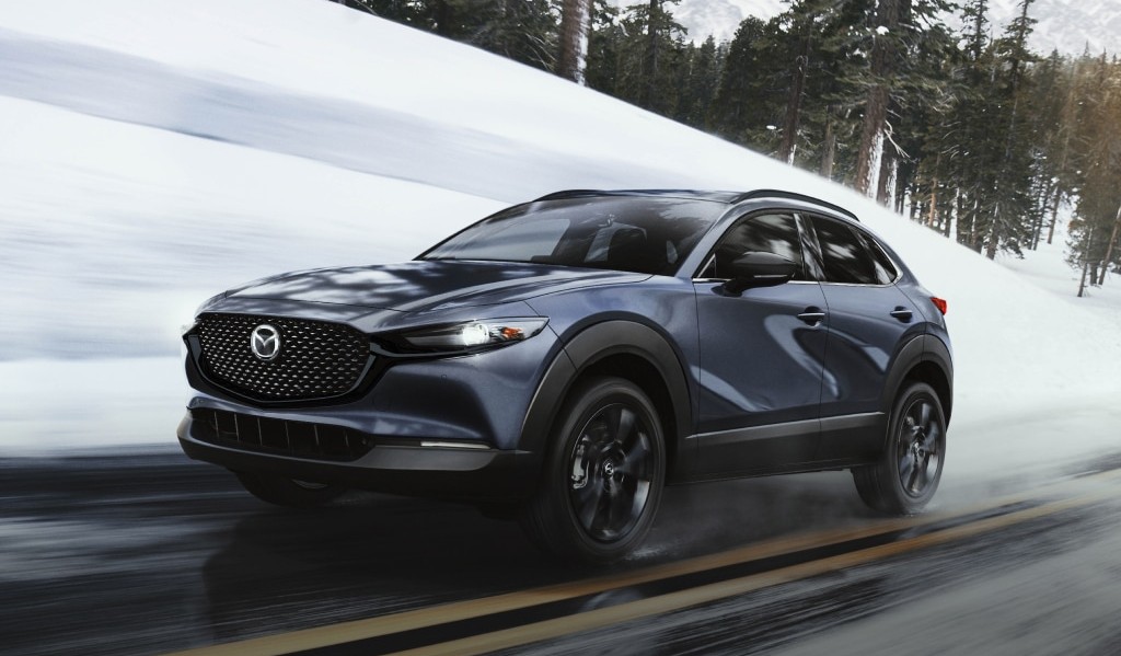 Mazda CX-30 driving on the highway in winter