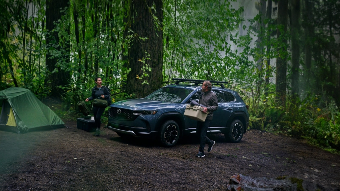 2025 Mazda CX-50 off-road in a forest camping