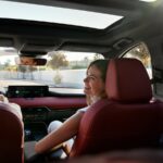 Couple sitting in the front seats of a 2026 Mazda CX-70
