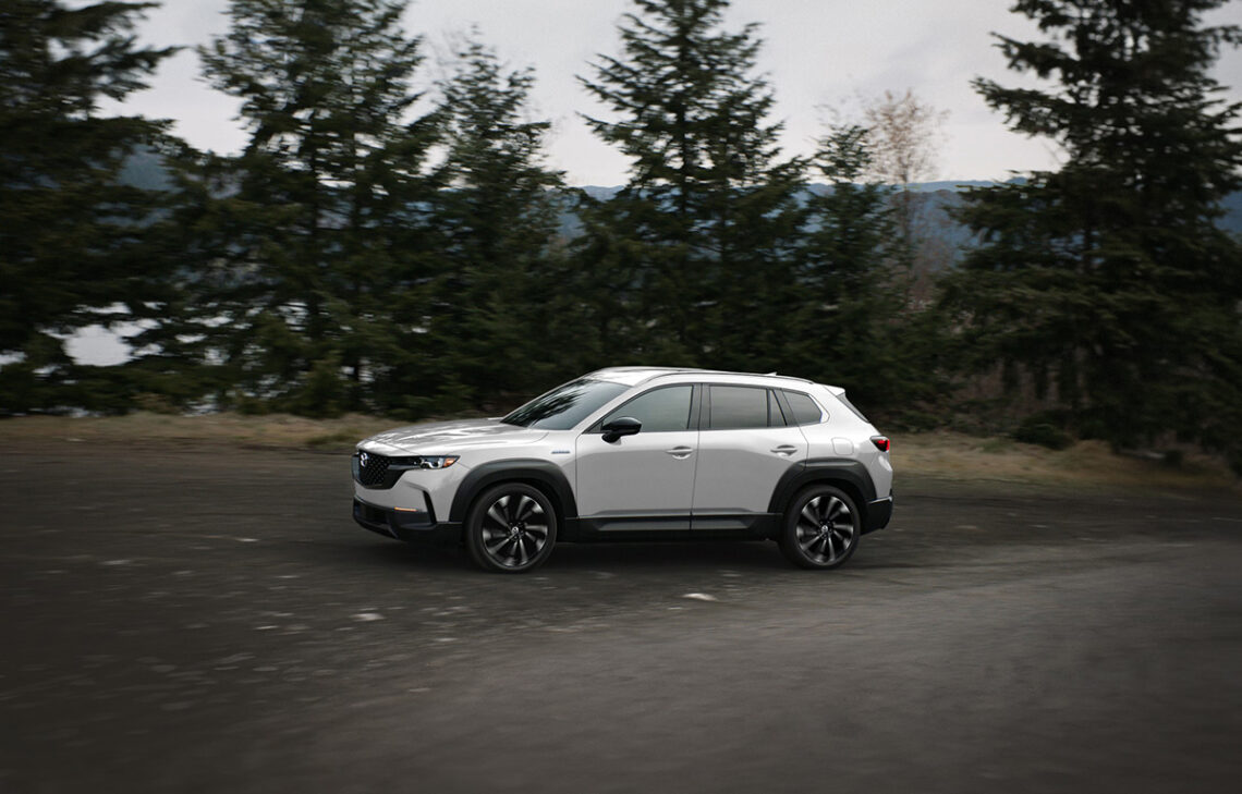 Mazda CX-50 parked in the woods