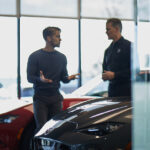 Customer and dealer in the Mazda showroom